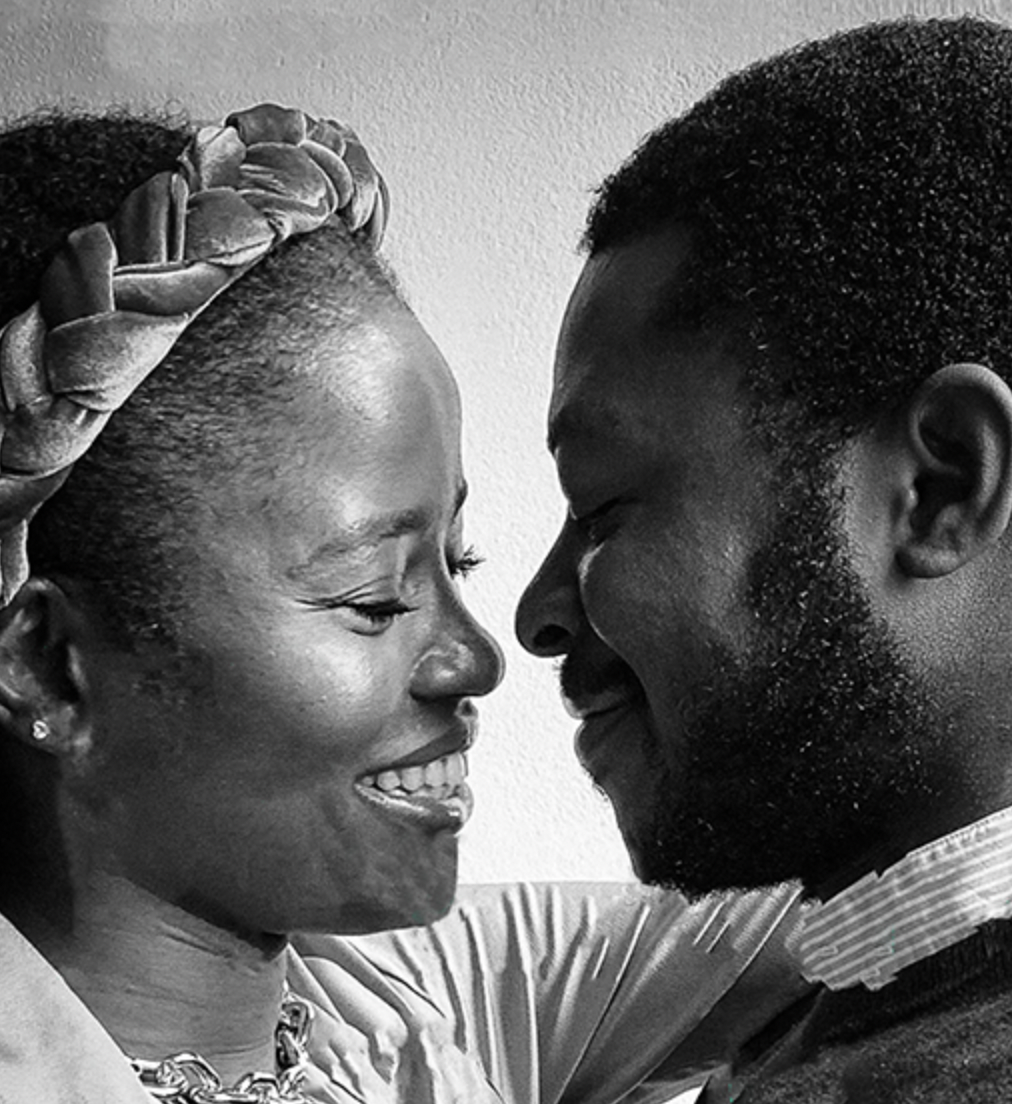 Couple sharing intimate moment during engagement