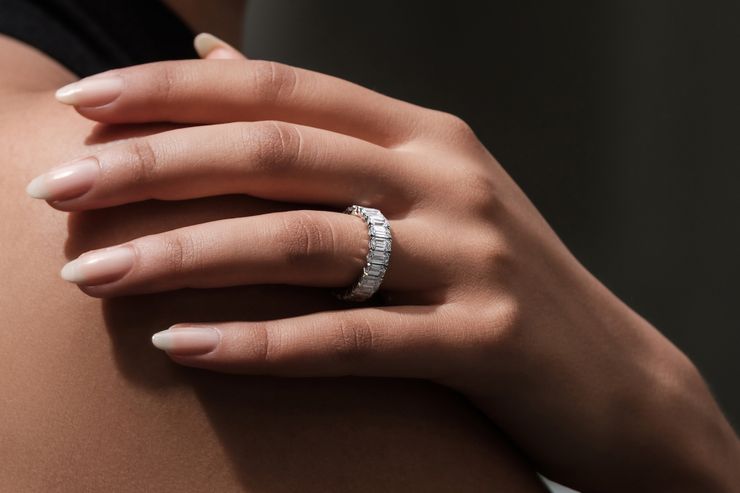 Diamond baguette eternity ring on hand