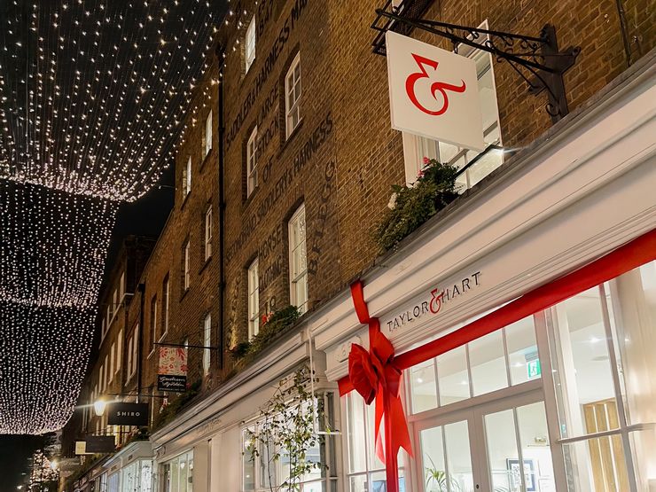 Taylor & Hart shop entrance with window displays