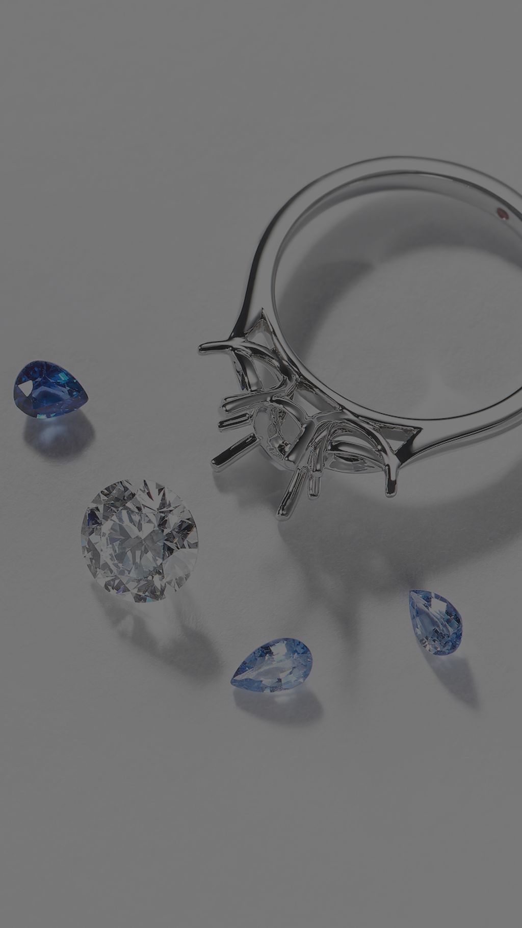 Blue sapphire beside bespoke engagement ring