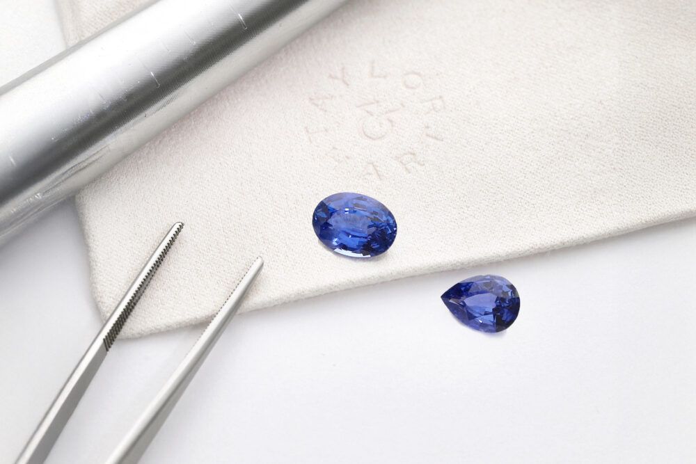 Natural blue sapphire gemstones on white background