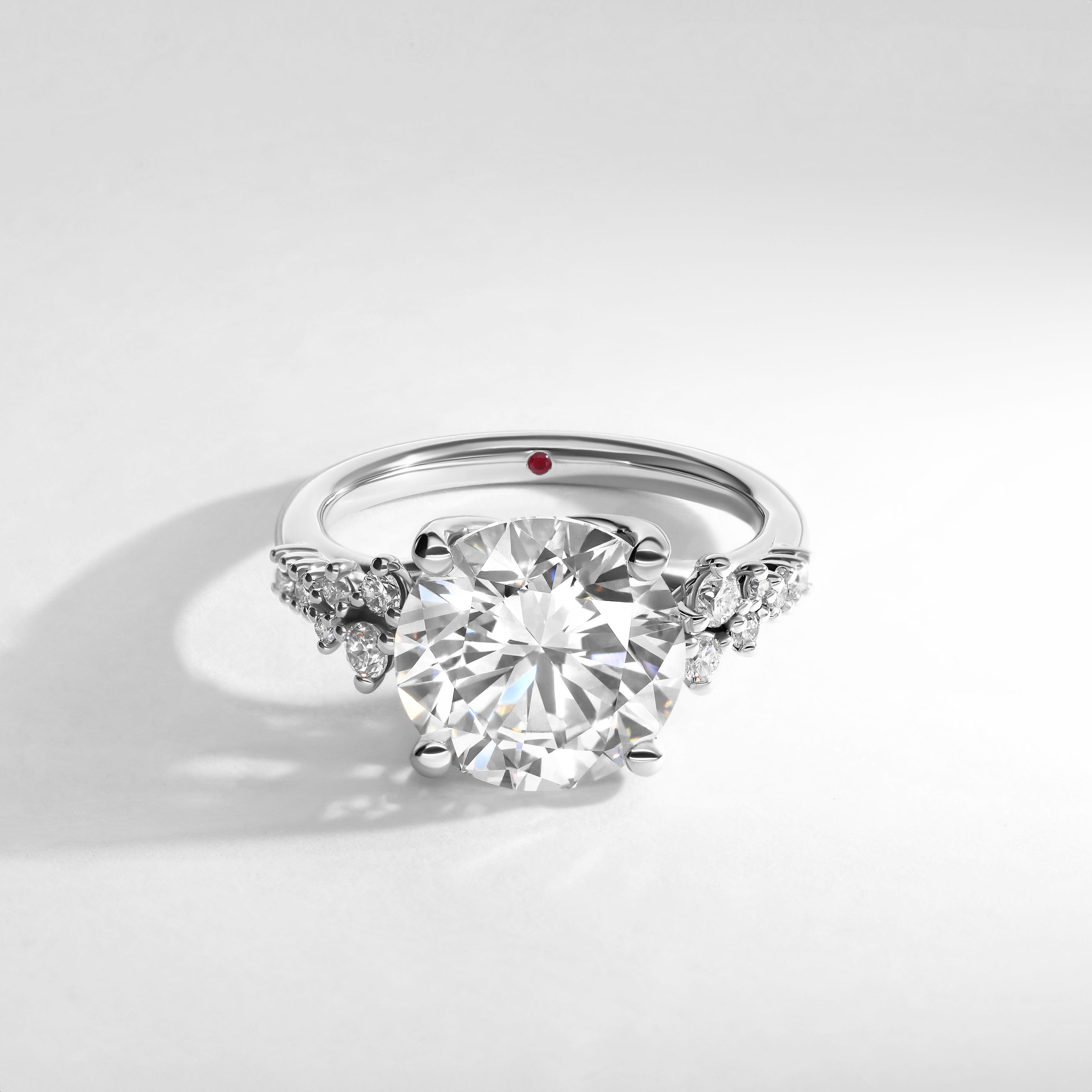 I want a round brilliant diamond in platinum, that scatters light across a room.