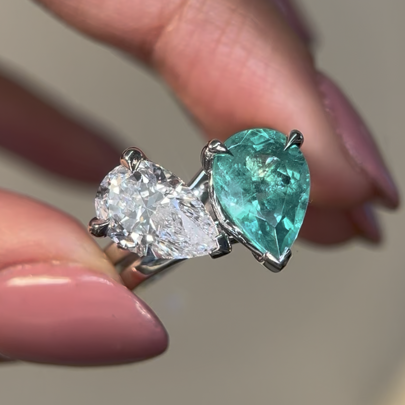 I want two stones and two colours, but one ring that tells our story.