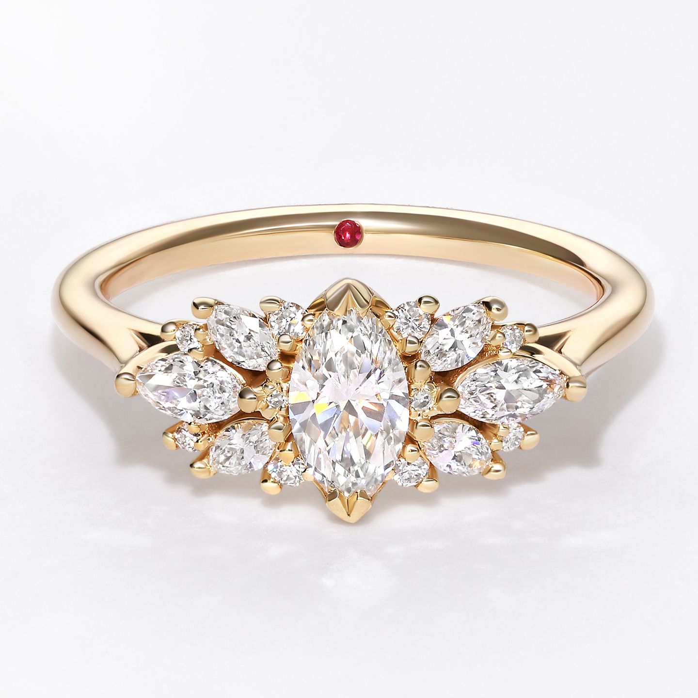 I want a marquise diamond at the centre of something that radiates in every direction.
