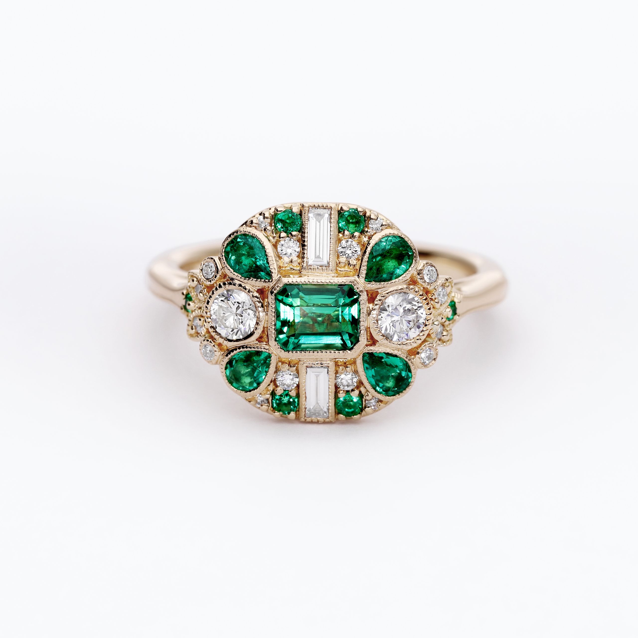 I want emeralds, and someone to design the whole ring around me.