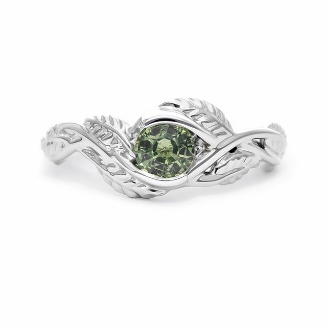 I want a green sapphire wrapped in platinum vines, and a band that looks like it was designed after nature.