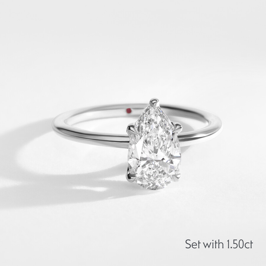 Demure Pear Cut Solitaire 18k White Gold Engagement Ring