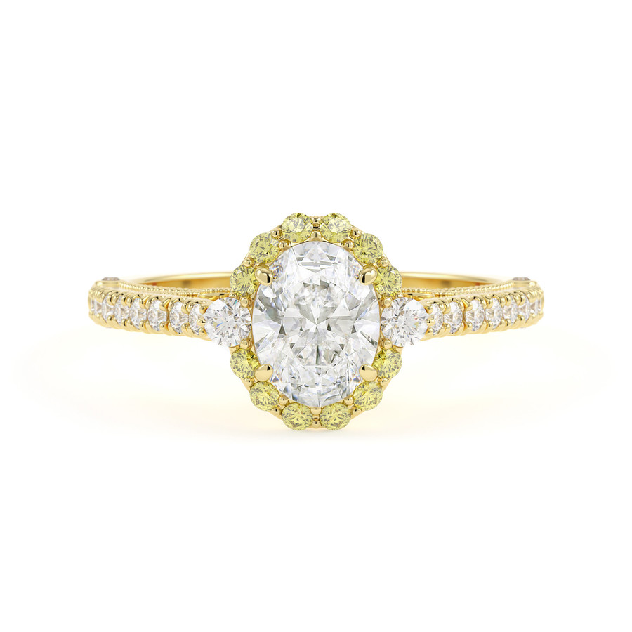Contemporary oval diamond and yellow diamond halo ring