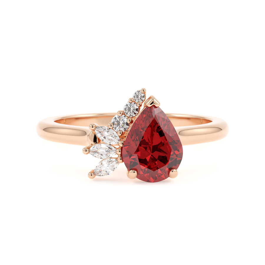 Unique pear ruby and asymmetrical diamond ring